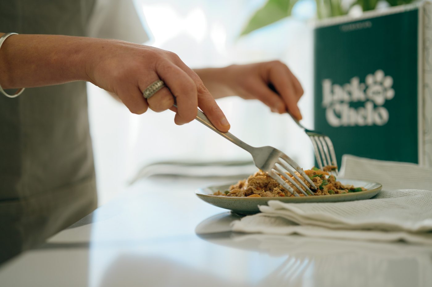 Plating a freshly cooked Jack and Chelo meal